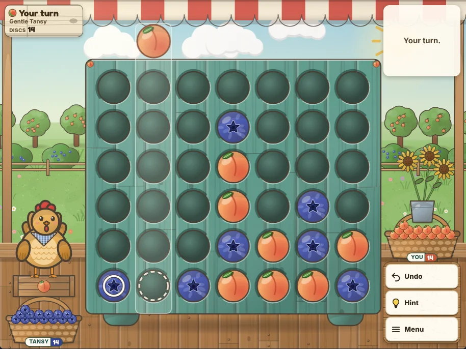 Actual Peach Lane Four in a Row gameplay on a desktop browser: the teal wooden rack on the fruit stand counter partway through a game, with a peach waiting above the second column where the pointer rests and a dashed ring on the space where it would land, Tansy’s last blueberry ringed in white, Tansy the hen on her crate at the left above the basket of blueberries, the turn sign at the top left, the message line at the top right, and the basket of peaches and Undo, Hint and Menu at the right.