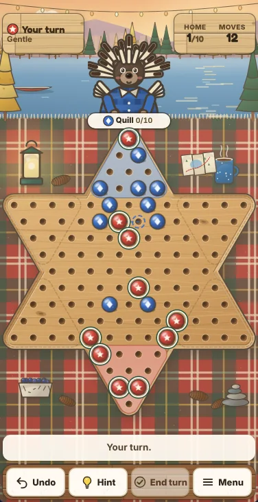 Actual Tamarack Lake Chinese Checkers gameplay on a phone-sized screen: the turn sign and counters at the top beside Quill the porcupine at the lake shore, the wooden star board filling the width below with red star marbles and blue diamond marbles partway across, the message line, and Undo, Hint, End turn and Menu on the shelf at the bottom.