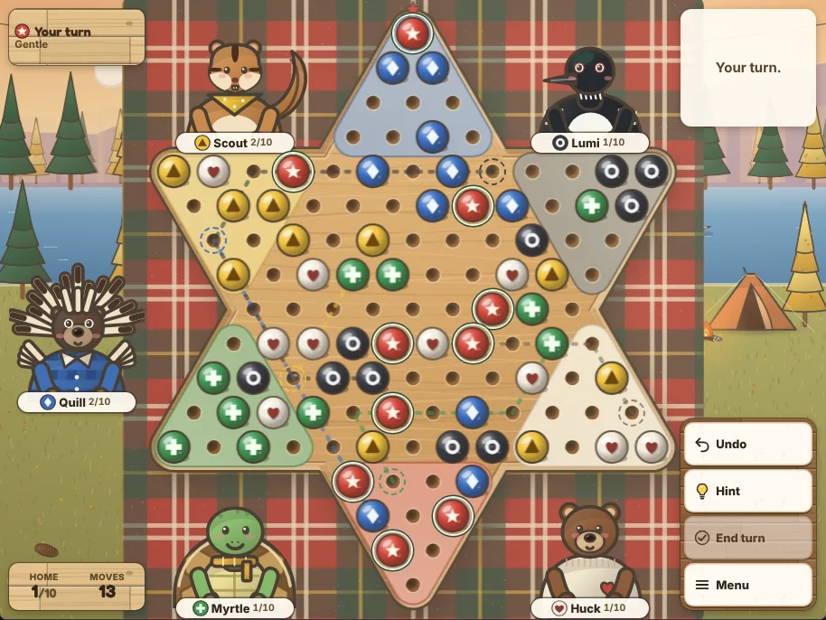 Actual Tamarack Lake Chinese Checkers gameplay on a desktop browser: a six-player game partway through, the wooden star board on a plaid camp blanket with marbles of six colors and shapes spread across the middle, the red star marbles that can move ringed, Myrtle, Scout, Quill, Lumi and Huck seated round the board with name tags showing how many of their marbles are home, the turn sign and counters on the left, and Undo, Hint, End turn and Menu on the right.