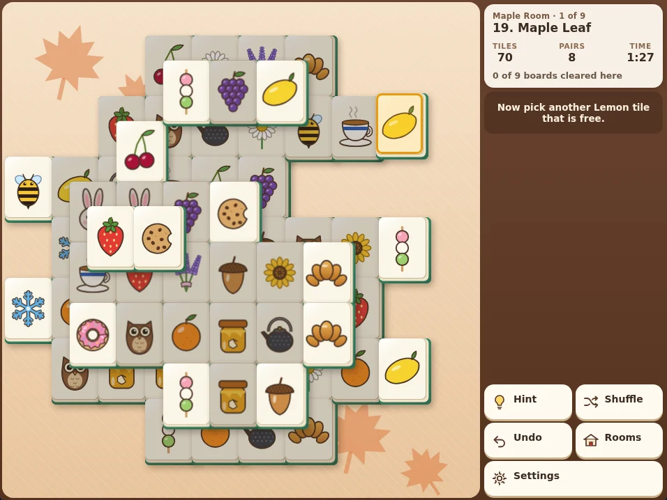 Actual Teahouse Mahjong gameplay on the Maple Leaf board with Garden tiles: 70 tiles left in three layers, a lemon tile picked up with a gold outline, blocked tiles dimmed, and the side panel showing the Maple Room, 8 open pairs, the time, the message Now pick another Lemon tile that is free, and the Hint, Shuffle, Undo, Rooms and Settings buttons.