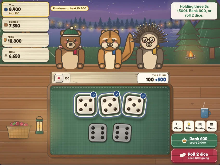 Actual Thimbleberry Camp Dice gameplay on a desktop browser: Bonnie the bear, Nibs the chipmunk and Ollie the porcupine behind a plank table at a lakeside camp at dusk, the score tags for you and the three campers down the left, a birch board of set-aside dice with the turn’s points, the dice in a green felt tray with the held ones lifted and ringed, and the message, Clear, Hint, Scoring and Menu, Bank and Roll down the right.